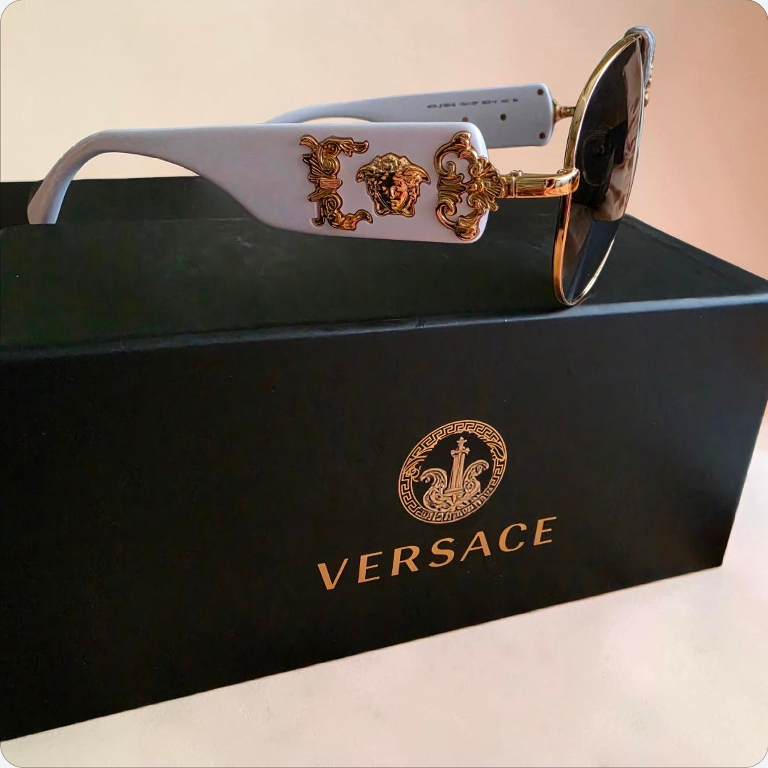 Sonnenbrillen  Herren & Damen Neu" Original ,,VERSACE "  Brillengläser Farbe in Schearz.