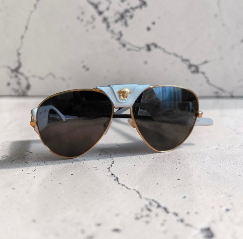 Sonnenbrillen  Herren & Damen Neu" Original ,,VERSACE "  Brillengläser Farbe in Schearz.
